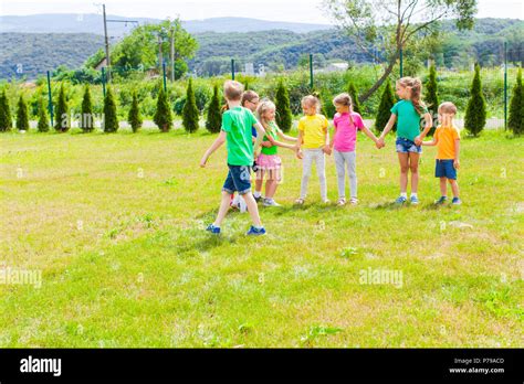 Active Children Playing Outdoor Games Stock Photo Alamy