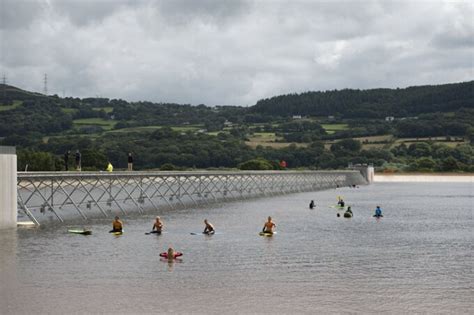 surf snowdonia surfers ride world s longest man made waves in wales