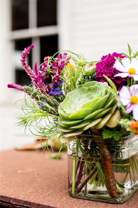 A Wildflower And Succulent Centerpiece From Julia And Davids Wedding