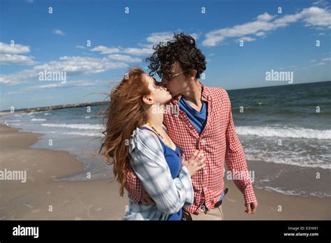 Romantic Couple Kissing On Beach Stock Photo Alamy