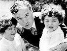 Charlie Chaplin with his sons, Charles Jr. and Sydney, 1929.