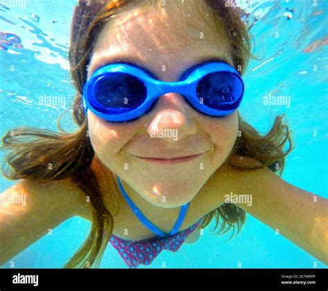 Child Swimming Underwater With Goggles Stock Photo Alamy