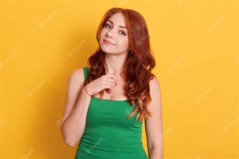 Premium Photo Portrait Of Beautiful Redhead Girl Looking At Camera