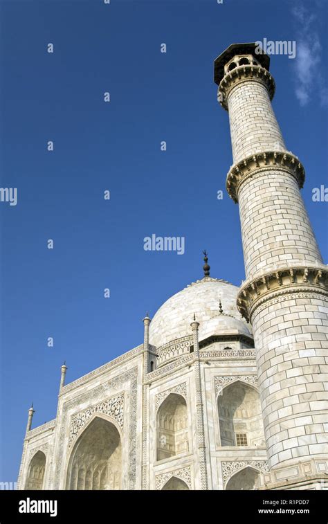 Minarets Stand At The Four Corners Of The Taj Mahal The Famous White