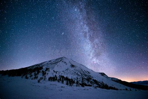 Milky Way Over The Snowy Peaks Of The Mountains Stock Photo Image Of
