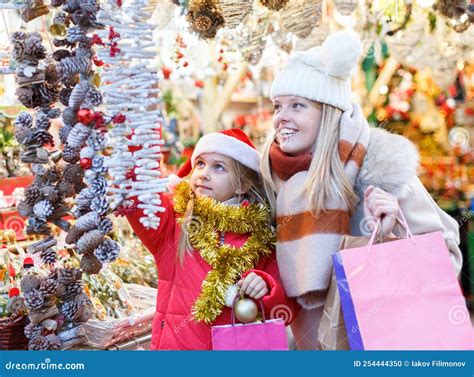 Family Shopping on Christmas Market Stock Photo - Image of purchasing