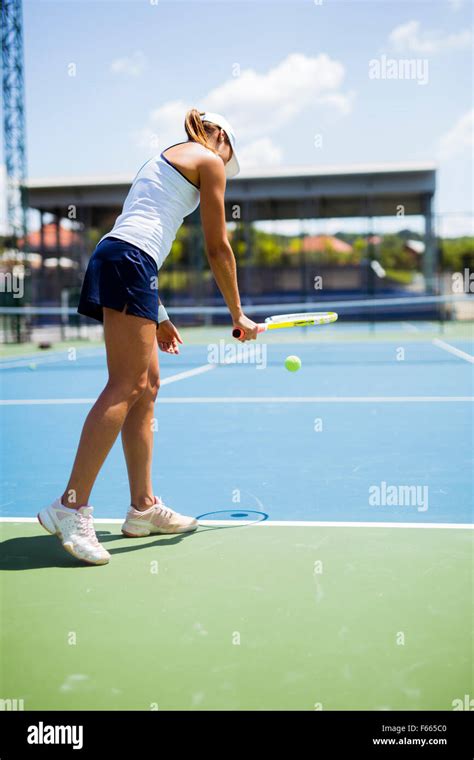 Beautiful Female Tennis Player Serving Outdoor Stock Photo Alamy