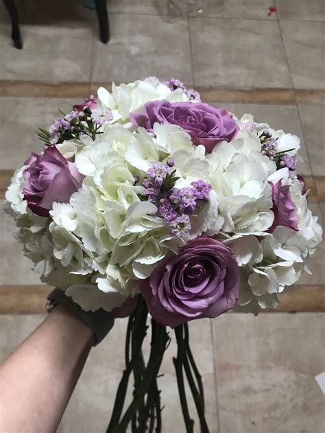 Quality customer service · premium wholesale flowers Practice diy bridal bouquet. Purple roses, white hydrangea ...