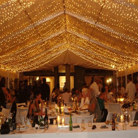 Wrap your decorations around a light fixture instead of the ceiling. Wedding Decorative Ceiling Hanging Fairy Lights For ...