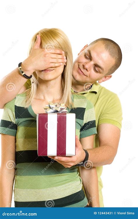 man surprising a woman with present stock image image of holiday present 12443431