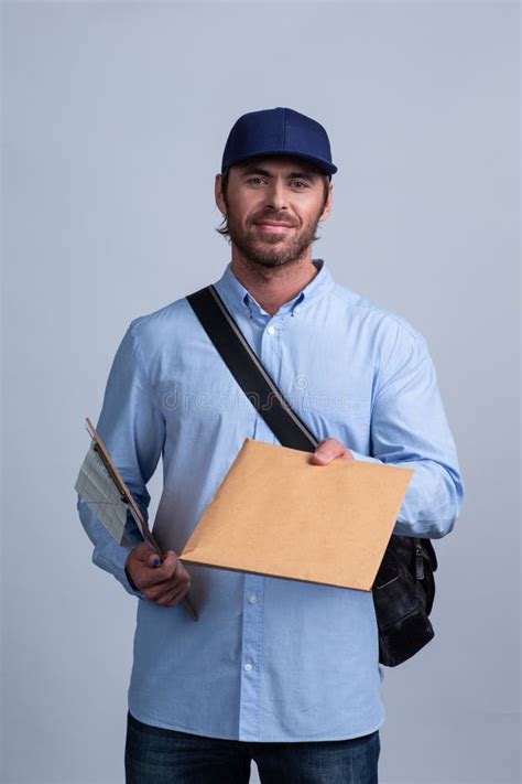 The Postman Delivering Parcel To The Office Stock Photo Image Of