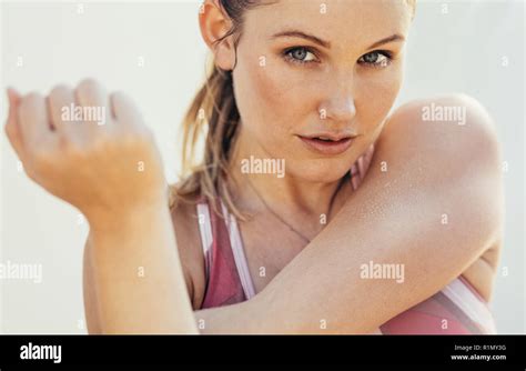 Close Up Of A Fitness Woman Doing Stretching Exercises Woman In