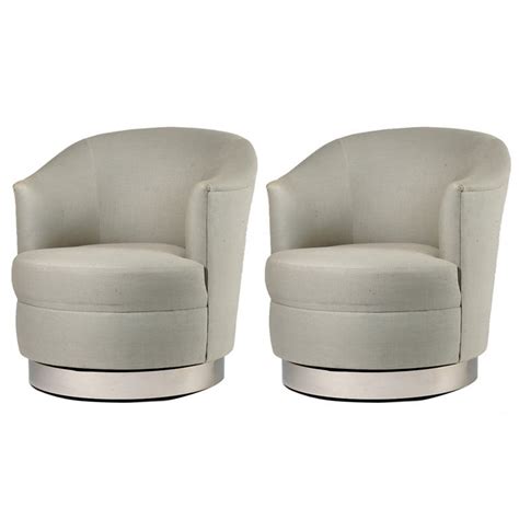 But there are still tricks you can use to still have what you want and to save space at the same time. Pair of Karl Springer Swivel Club Chairs For Sale at 1stdibs