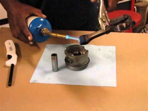 Rod lays on a horizontal shelf welded to the front side of 2x pipe fitting, and small end inserts to center of x. How to install a press fit piston wrist pin with out a ...