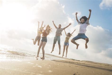 Beach Summer Holiday Sea People Concept Stock Photo Image Of Jump