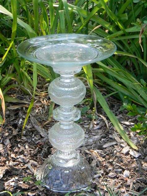 Add some stones and other décor or just paint it and leave. DIY Glass Bird Bath great way to re-purpose those vases ...