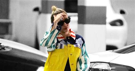 Miley Cyrus Colorful Denim Jacket Outfit