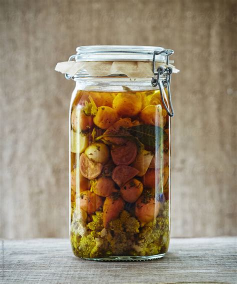Still Life Of Fermented Pickled Vegetables In Glass Jar By Stocksy