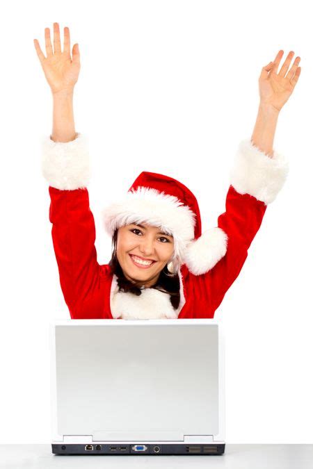 Christmas Girl Happy With Her Success While Working On A Laptop