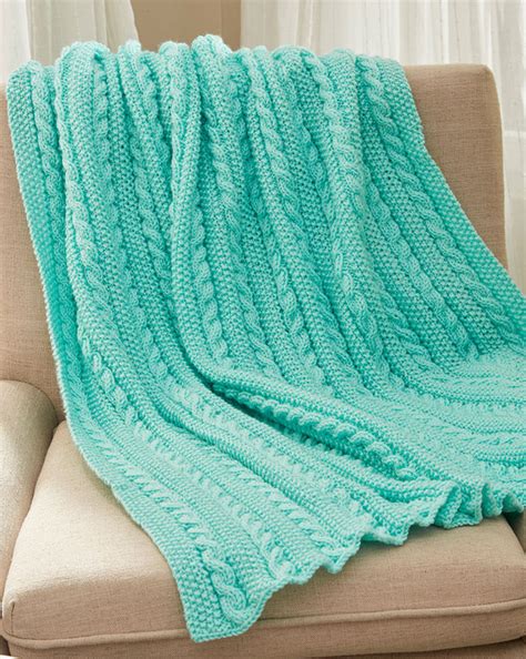 Afghan of modular pinwheel blocks inspired by traditional quilt designs. Easy Afghan Knitting Patterns | Cable knit blankets ...