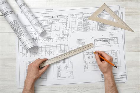 Close Up Hands Of Architect Working With A Drawing Stock Image Image