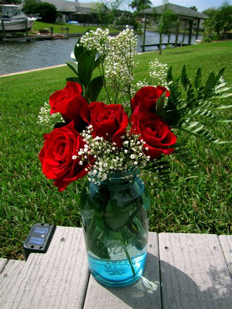 Roses In A Mason Jar Roses That My Hubby Got Me No Less D Mason Jar Centerpieces