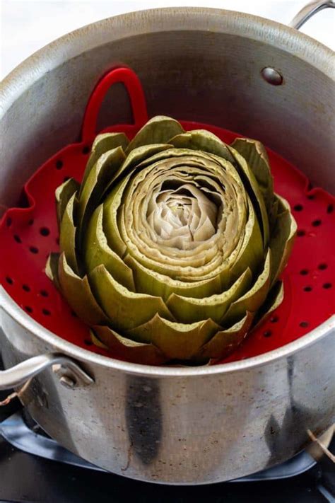 Boiling artichokes is such an easy recipe to make and as absolute favorite to eat in my household. How to Cook Artichokes - Jessica Gavin