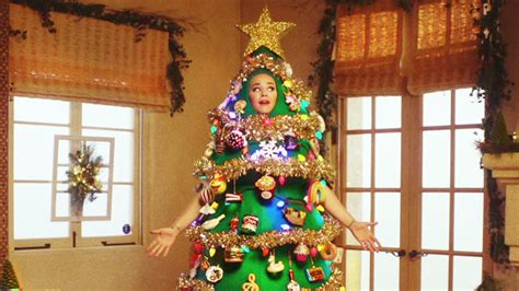 katy perry rocks christmas tree costume in ‘disney holiday singalong hollywood life