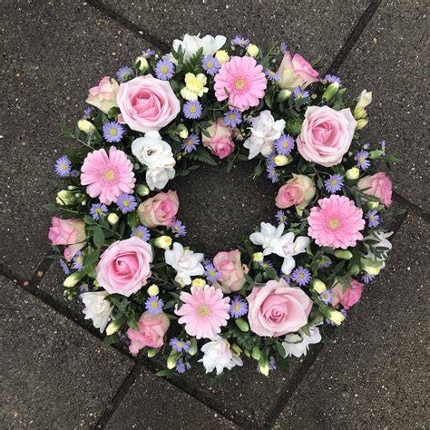 Pastel Wreath Funeral Flowers Tribute In Pink Lilac And Lemon