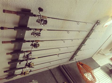 Free woodworking plans and projects instructions to build fish rod racks to keep your rods and reels in a safe place. Hubby made his own fishing rod holder for the garage ...