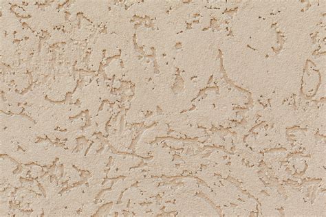 Beige Colored Stucco Surface Of Wall · Free Stock Photo