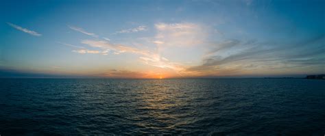 Download Wallpaper 2560x1080 Sea Horizon Sunset Clouds Sky Dual