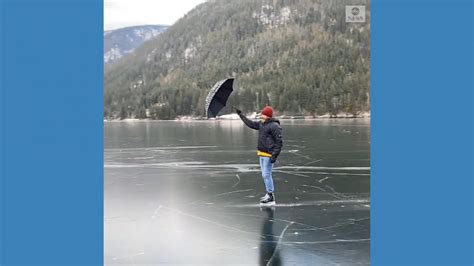 Video Ice Skater Glides ‘mary Poppins Style Across Frozen Lake Abc News