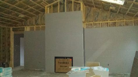 The Impatient Home Builder: Hanging the Sheetrock