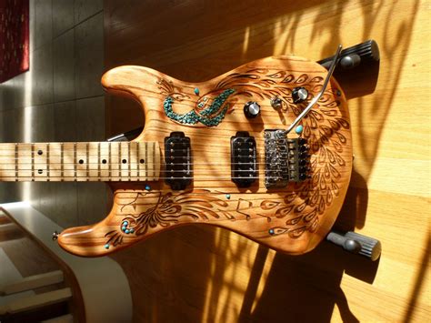 Hand Crafted Hand Carved Peacock Electric Guitar With Turquoise Accents By Ahnwu