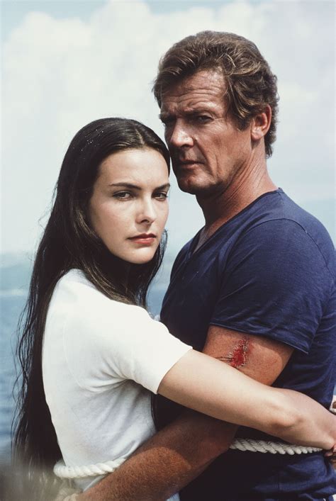 english actor roger moore as 007 with french actress carole bouquet as melina havelock on the