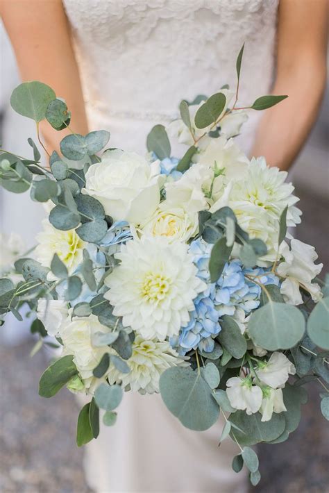 Maybe you would like to learn more about one of these? My bridal bouquet, light blue and white flowers with ...