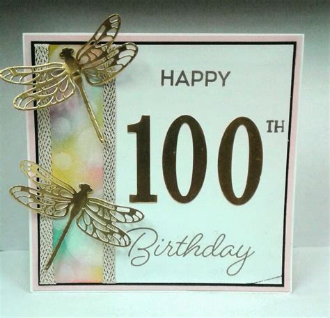 A Birthday Card With A Dragonfly On Its Side And The Words Happy 100th