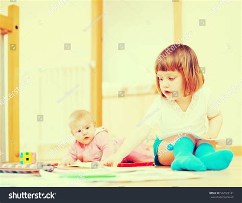Two Happy Children Playing Together Home Stock Photo 502624141
