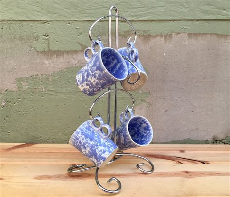 Maybe you would like to learn more about one of these? Vintage Chrome Metal Coffee Mug Tree 6 Cup Display Rack ...