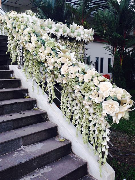If your reception venue includes a staircase, you may be asking yourself how. Cornhusk flower stair decoration | Paper flowers roses, Corn husk, Stair decor