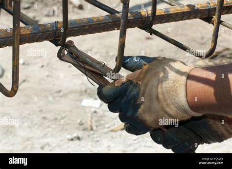 Construction Worker Ties Reinforcing Steel Stock Photo Alamy