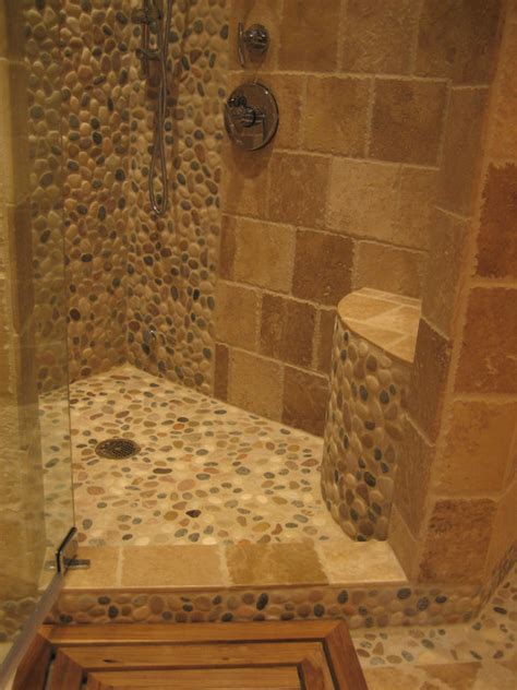 Browse rustic bathroom designs and decorating ideas. Island Stone pebble bathroom design - Rustic - Wall And ...