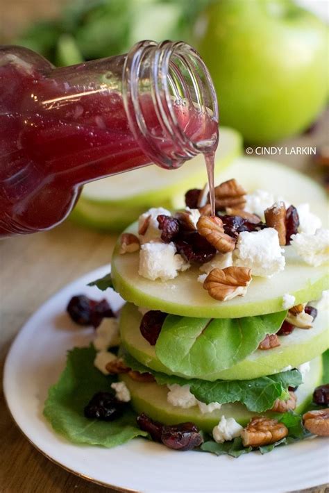 With the addition of caramelized apples, toasted pecans, and creamy goat cheese, this retro spinach salad finally achieves perfect harmony in the 21st century with nearly half of the caloric intake. Apple, Goat Cheese and Cranberry Salad - Eighteen25