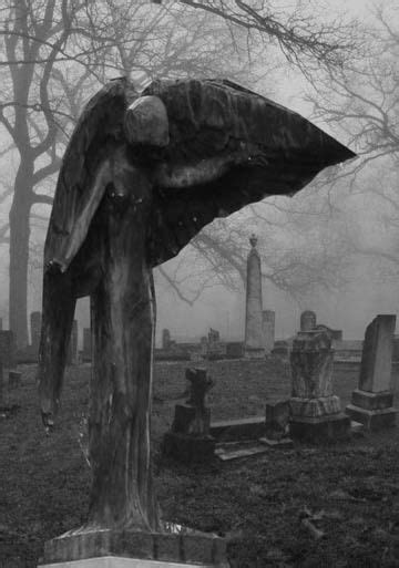 creepy cemetery angel statues
