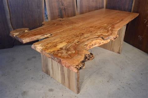 This handcrafted item perfectly blends industrial hairpin legs with a beveled wooden top. #7 - 7'3" Spalted Maple Burl Dining Table
