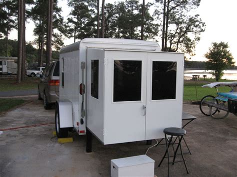 Cargo Campers Swing Out The Back Door And Pull Out The Slide Out