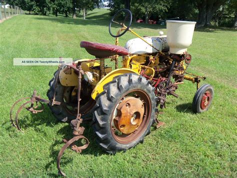 International Farmall Cub And Cultivators And Side Dresser Yellow And White