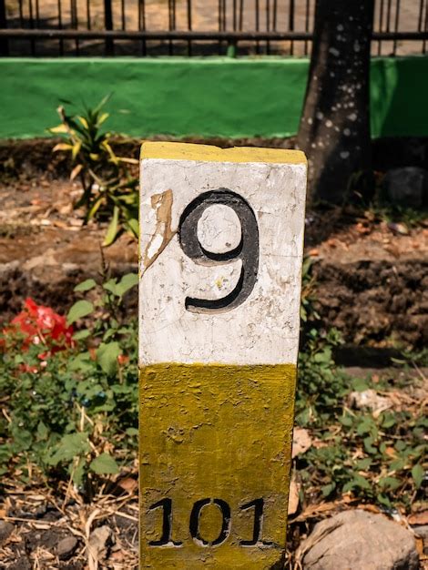 Premium Photo Road Kilometer Markers With Numbers 9 And 101 Listed