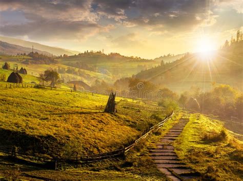 Steps Down To Village In Foggy Mountains At Sunset Stock Image Image